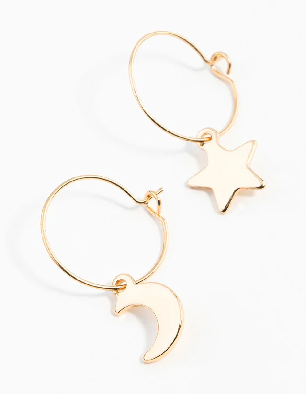 Women’s blue sapphire earrings-Gold Star & Moon Huggie Earrings