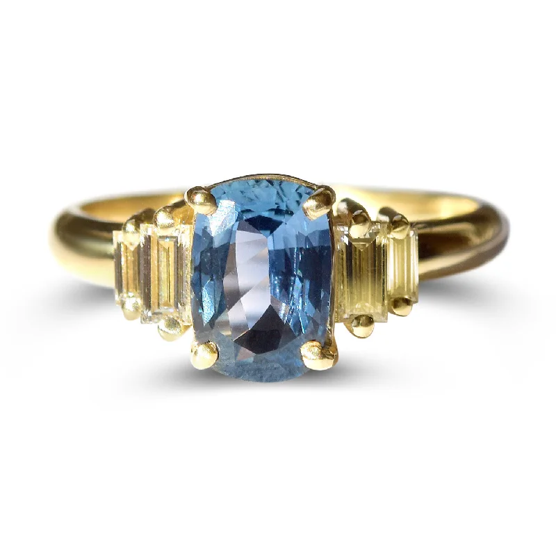 Women’s simple engagement rings-Icelandic Lake Ring - Cushion Cut Blue Sapphire with Baguette Diamond Sidestones in 14k Yellow Gold