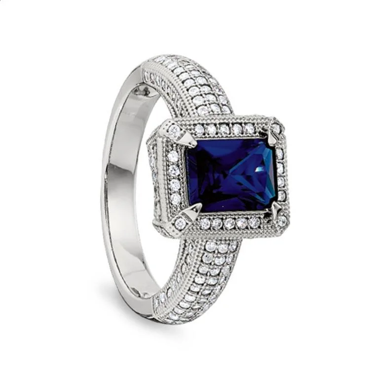 Women’s emerald and diamond engagement rings-Emerald Cut Synthetic Blue Sapphire Women's Ring with Simulated Diamonds