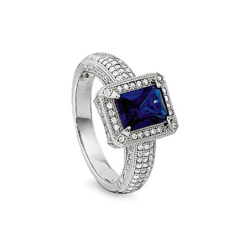 Women’s engagement rings with a vintage look-Emerald Cut Synthetic Blue Sapphire Ring with Simulated Diamonds